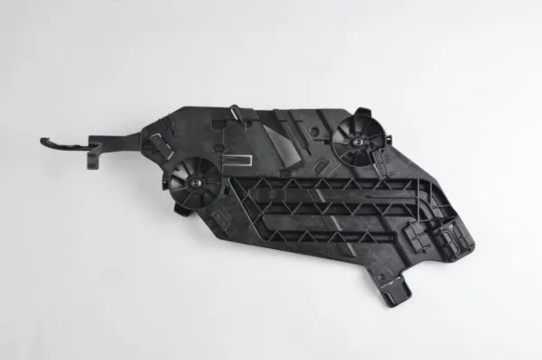 Wspornik (adapter) mocowania reflektora przedniego prawego 1Z0941464A VAG