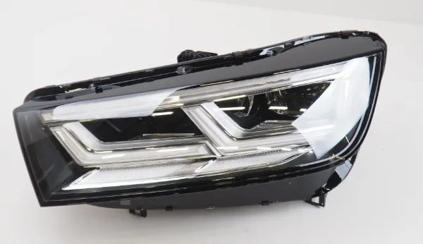 Reflektor lewy 80A941773J VAG