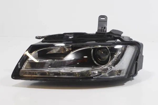 Reflektor lewy 8T0941029AK VAG