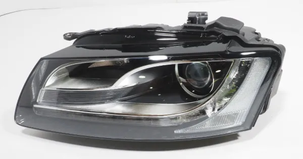 Reflektor lewy 8T0941029AN VAG
