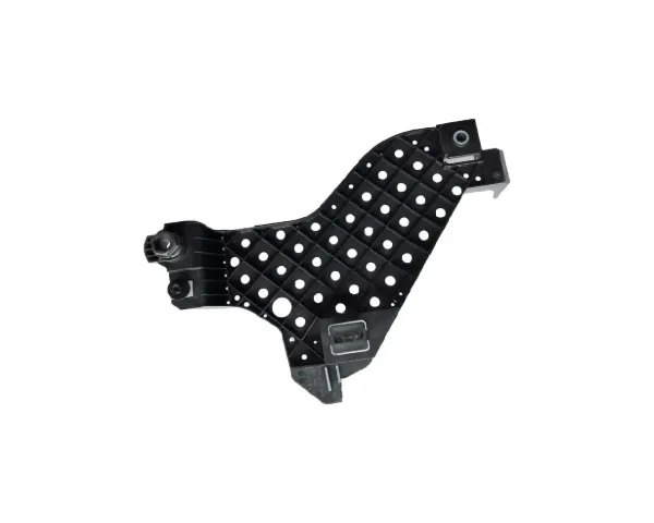 Wspornik (adapter) mocowania reflektora przedniego prawego 8U0941454 VAG