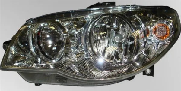 Reflektor lewy 51754472 Fiat/Alfa/Lancia