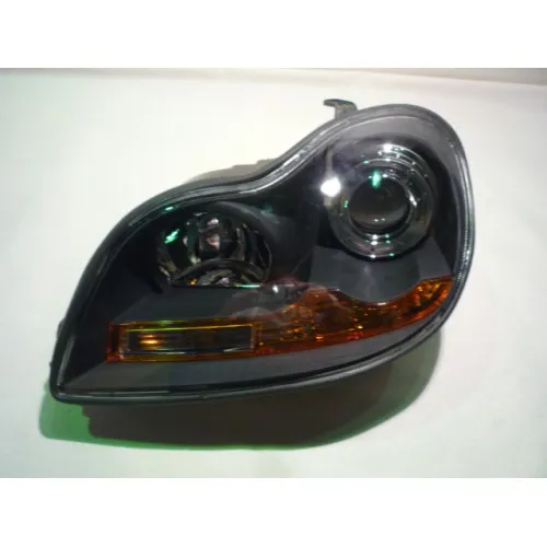 Reflektor lewy 1701051180 Geely