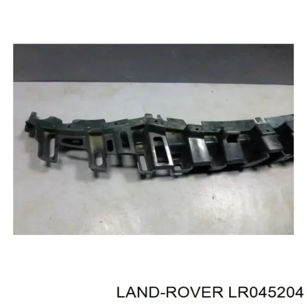 Wspornik zderzaka przedniego środkowy LR045204 Land Rover