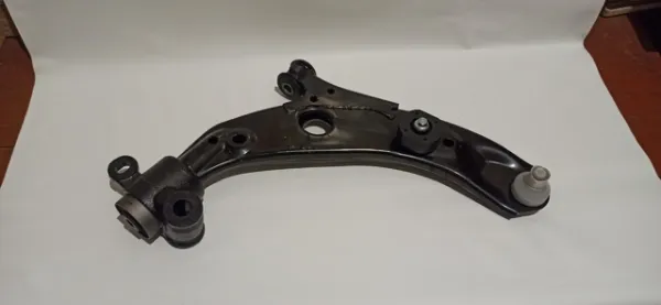 Wahacz zawieszenia przedniego dolny prawy TM5234300A Ford