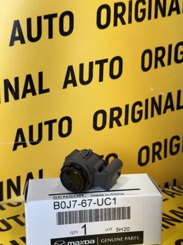 Czujnik parkowania przedni boczny B0J767UC1 Mazda