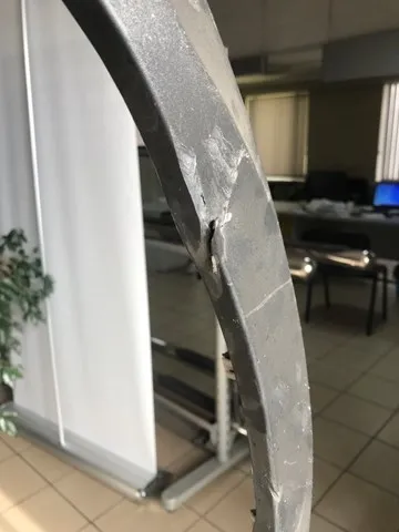 Poszerzenie (nakładka) reperaturki tylnego błotnika lewy 98257367XT Peugeot/Citroen