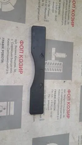 Ramka do mocowania przedniej tablicy rejestracyjnej 5211433500 Toyota