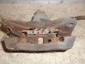 Zacisk hamulcowy tylny lewy Subaru Legacy B13