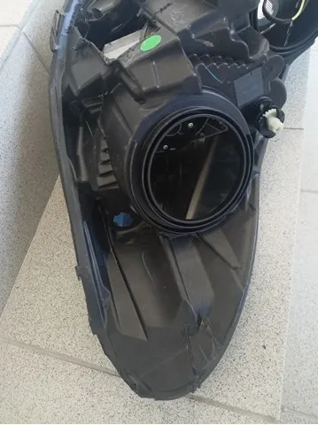 Reflektor prawy GJ5413W029BF Ford
