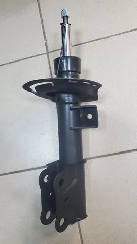 Amortyzator przedni prawy DG9Z18124T Ford