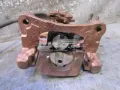 Zacisk hamulcowy tylny lewy Nissan Primera P10