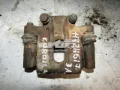 Zacisk hamulcowy tylny lewy Toyota Corolla E12