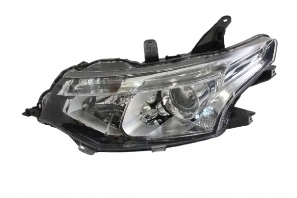 Reflektor lewy 8301C203 Mitsubishi