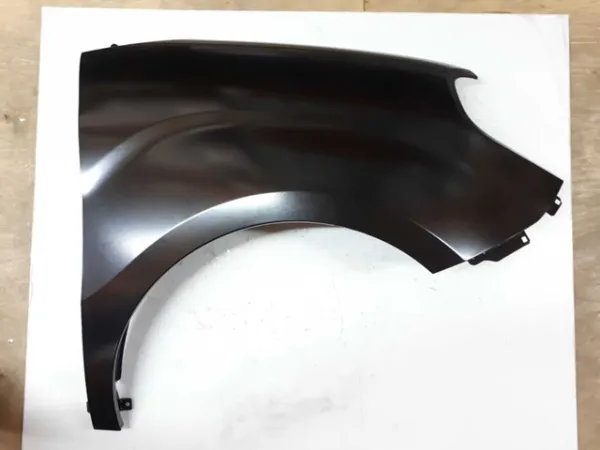 Błotnik przedni prawy 51973881 Fiat/Alfa/Lancia