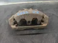 Zacisk hamulcowy przedni lewy Subaru Forester S10, SF