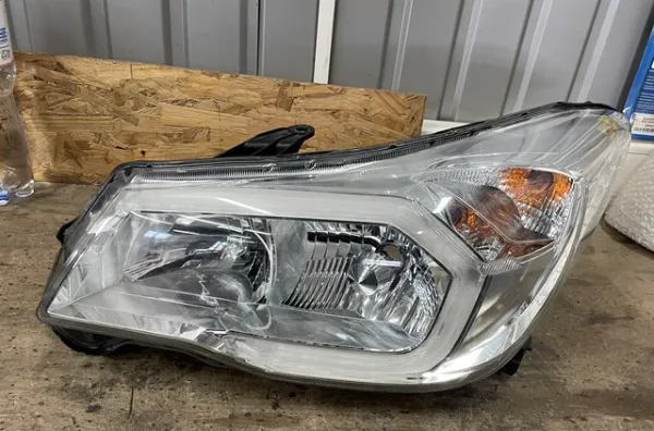 Reflektor lewy 84002SG030 Subaru