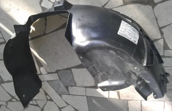 Nadkole błotnika przedniego lewe 24462907 Opel