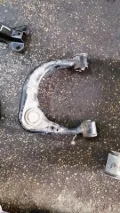 Wahacz zawieszenia przedniego górny lewy Toyota Hilux KUN25
