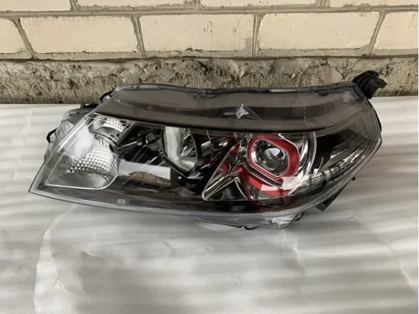 Reflektor lewy 3532054P50000 Suzuki