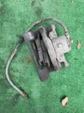 Jarzmo zacisku hamulcowego przedniego Toyota Corolla E12