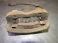 Zacisk hamulcowy przedni prawy Nissan Primera P10
