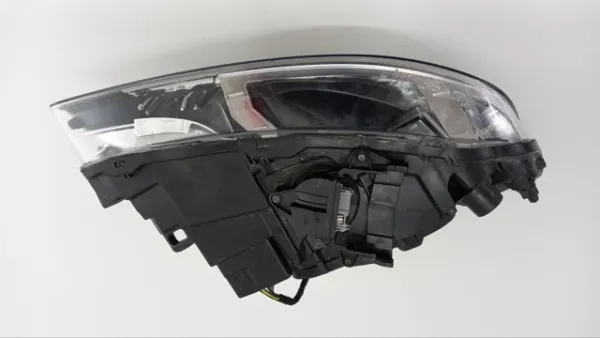 Reflektor lewy 31698818 Volvo