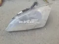 Pokrywa reflektora lewego Ford Focus CA5