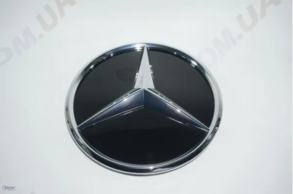 Uchwyt emblematu kratki chłodnicy A0008800100 Mercedes