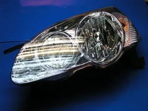 Reflektor lewy BYD F3 