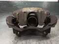 Zacisk hamulcowy przedni prawy Toyota Corolla R10