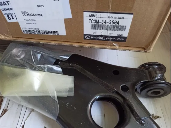 Wahacz zawieszenia przedniego dolny lewy TC3M34350A Mazda