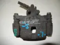 Zacisk hamulcowy tylny lewy Subaru Forester S10, SF