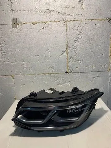 Reflektor lewy 5NB941081C VAG